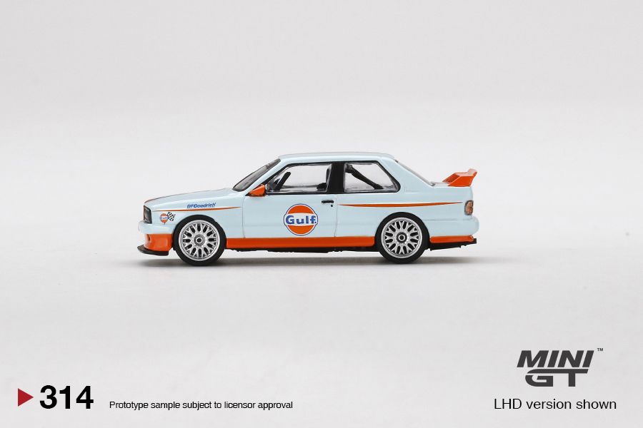 1/64 Mini GT #314 Mijo Exclusives World Wide BMW M3 E30 Gulf Livery Limited Edition mgt00314