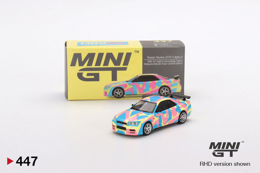 1:64 Mini GT #447 Nissan Skyline GT-R (R34)V-Spec ll MINI GT Digital Camouflage Yellow mgt00447